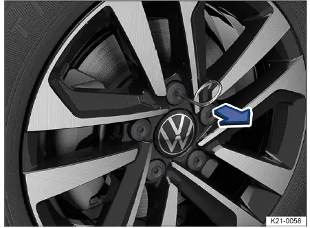 Volkswagen ID.4 - Fig. 1 Remove the caps from the wheel bolts.